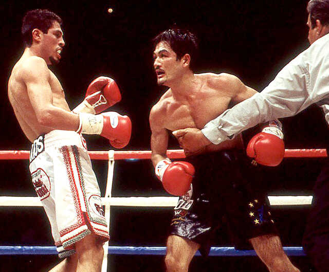 オスカー・ラリオスvs仲里繁 第１戦　2003年間最高試合　ボクシングポスター 仲里繁の強打が王者・ラリオスのアゴを打ち砕く けんかに勝って勝負に